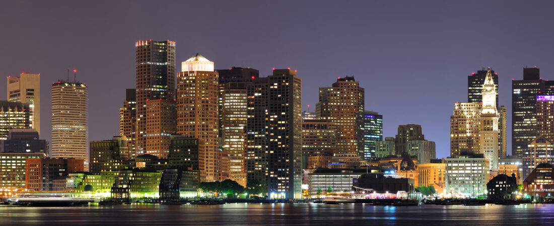 Urban city night scene panorama from Boston Massachusetts.